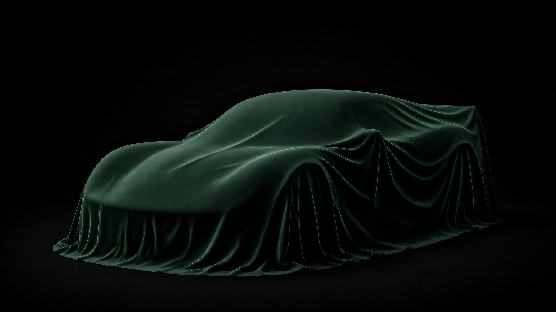 A Lotus Exige S1 under a green velvet cover, three-quarter view, black studio background